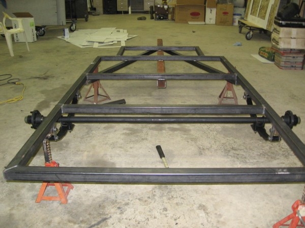 57" wide 96" long with 24" X 40" tongue box
