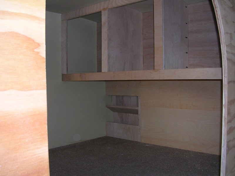 pic of cabinets and the mini dvd/magazine rack/etc.