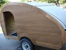 New 1/8 oak ply skin, door holes, and trim