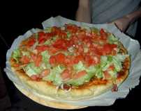 BLT Pizza topped will chilled lettuce & tomato