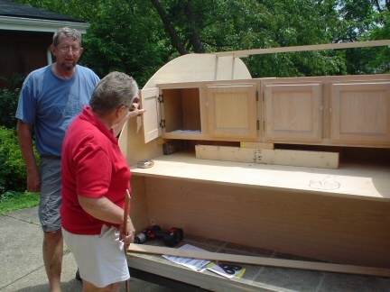 Helen, Bill's wife, checking out the kitchen layout. Later she gave two thumbs up.