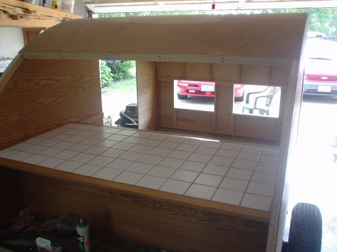 Kitchen Counter......wood trim on all sides, matt finish tiles and flexible grout