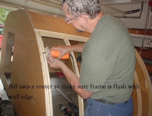 Bill uses router to make sure hatch frame is lined up with side wall.