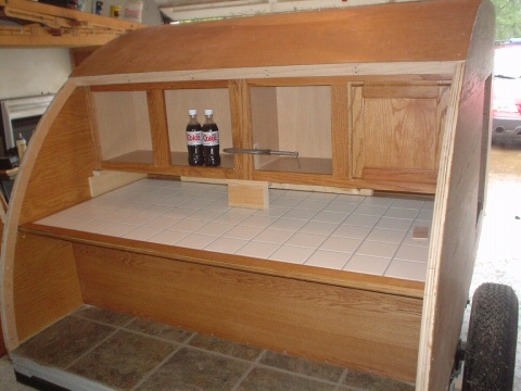 Out of order but another look at mock up kitchen before we glued hatch onto frame.  Everyday I visit Bill we share a Diet Coke and today it stayed in the galley until we were ready for a break.  Things are looking good for the galley overall.