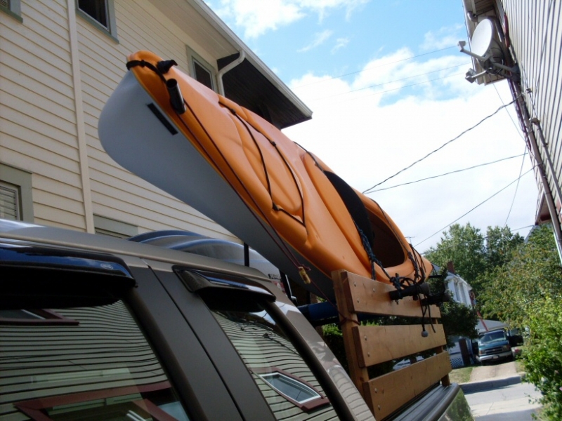 Roof rack with kayak