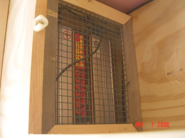 Left front upper cabinet and 2,000 watt converter.