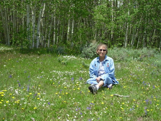 Lenora & field of wildflowers, above 9000' in WY