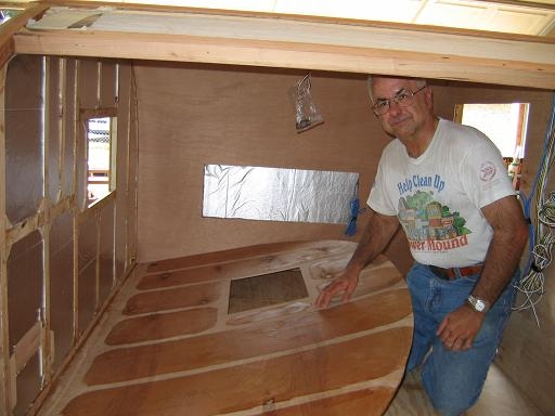 Paneling is ready to go up I have given a coat of varnish on the inside.