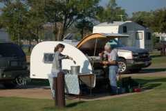 Washing dishes at Bernice State Park.