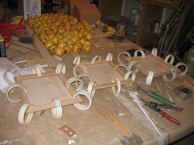 How do you like them apples? Actually it's the clamps on the three front cabinet doors.