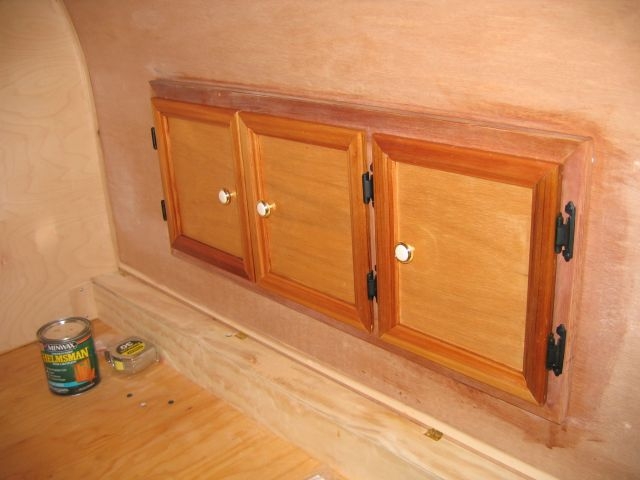 The tongue box cabinet doors are hung.