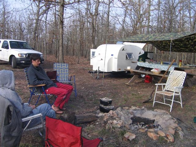 Waiting on supper two dutch ovens ,lasagne, and Apple cobbler.