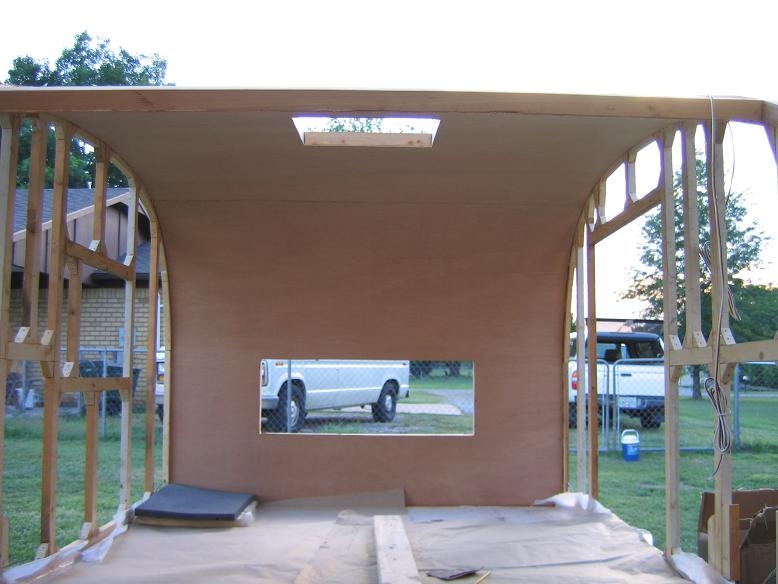 Ceiling installed using 1/8th inch luan. The hole is not for a window , but a future tounge box.