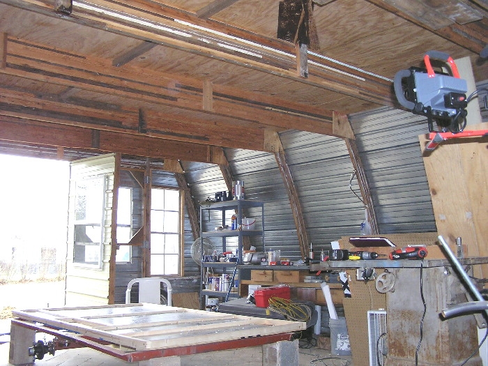 from back, looking to the work table side of the shop.