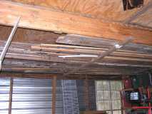 scrap wood pile in rafters