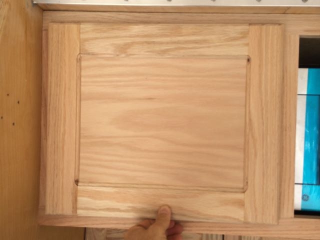 Cabinet door before stain