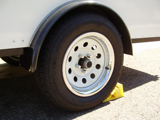 Wheel with Chrome Trim and Lug Nuts