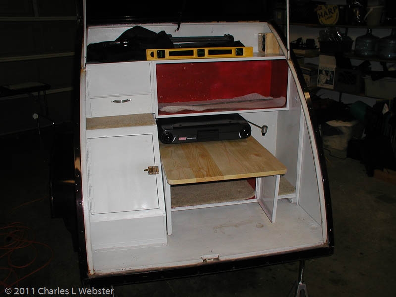 Galley with counter top in place on open doors