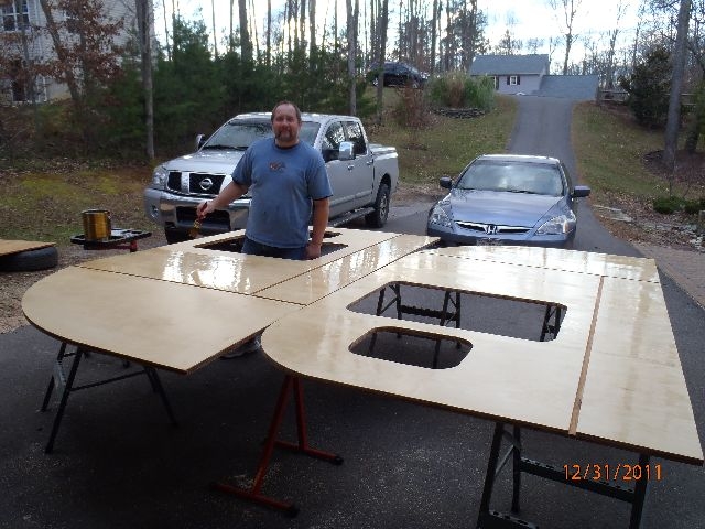 Polyurethane being applied to panels