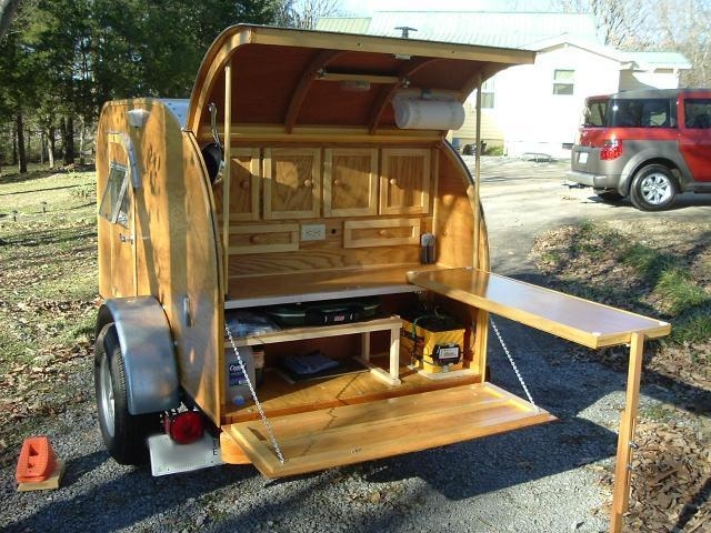 Another view of galley table.  Also new shelf under counter that holds Coleman stove.  Big cooler rides in the car.