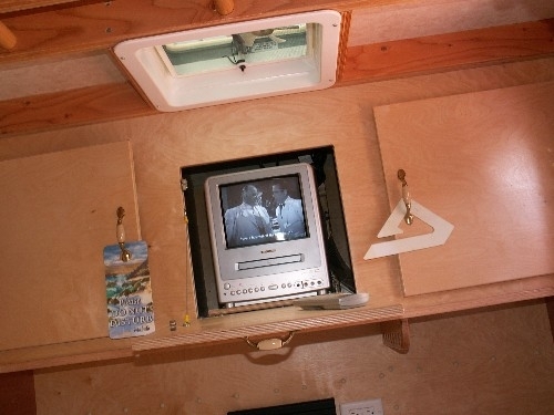 Cabinets, A/C is in left cabinet.  Storage on the right.