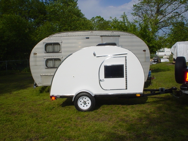 Teardrop parked next to our old trailer