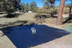 Coleman Event Shelter 15 groundsheet with shelter in bag.