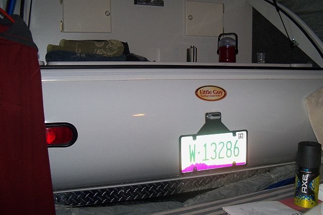 Rear of Little Guy Teardrop Trailer inside SUV tent