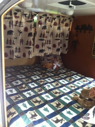 Foot of bed showing curtains