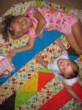 Titus and Emilia on quilt