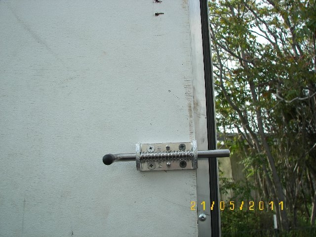Temporary man door latch