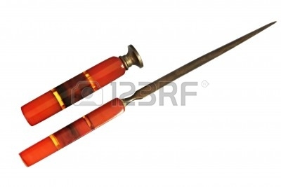 3083705-antique-tortoiseshell-letter-opener-and-seal-isolated-on-white