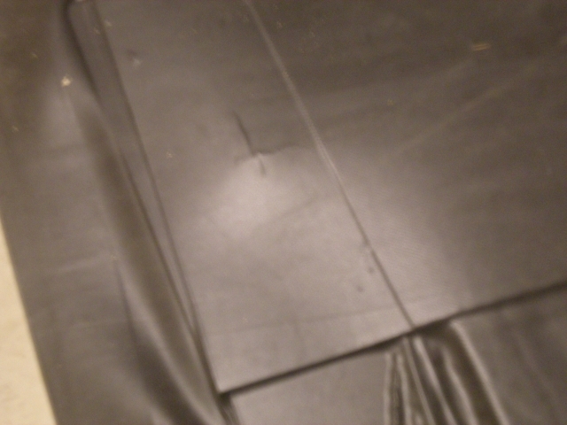 cracked interior ply shows thru