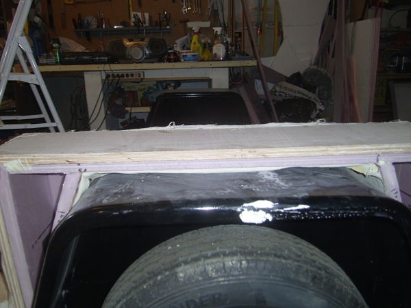 58b.wheel well cover prior to attaching to wall