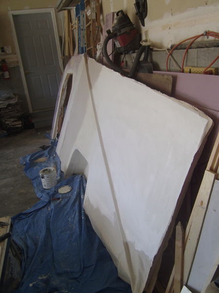 63.left side exterior partially canvassed and painted