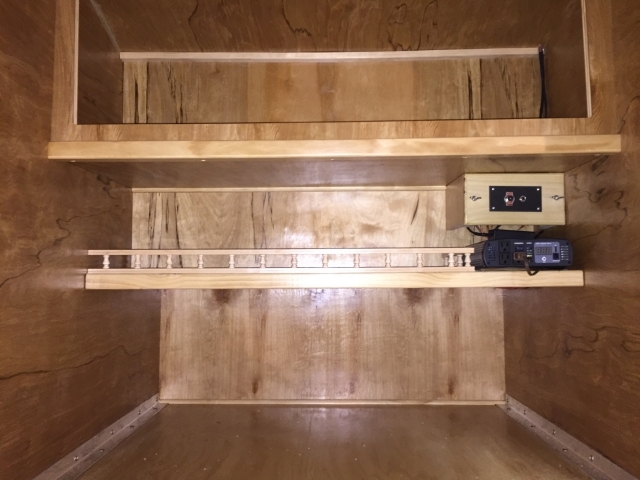 Interior shelf with electrical