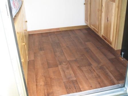 the floor; glueless linoleum that looks just like wood