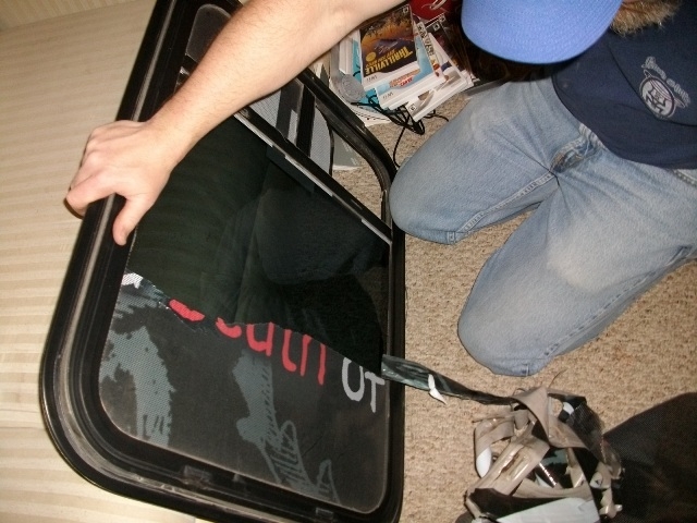 Cleaning up the Hippie Bus Windows.