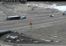 wind in wyoming with over turned semi trailer.