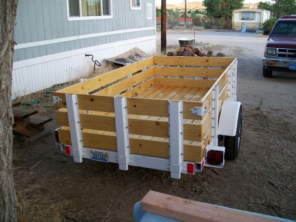 Flatbed Trailer, I built last year. I used a pop-up tent trailer frame from a guy that sells frames from stripped out travel trailers, (before I found out about TDs). 52" x 98" For hauling building supplies for home improvement projects.