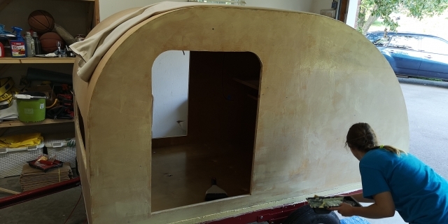 applying glue to wall