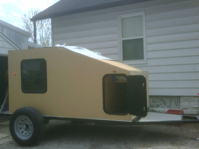 Another side view with storage door open