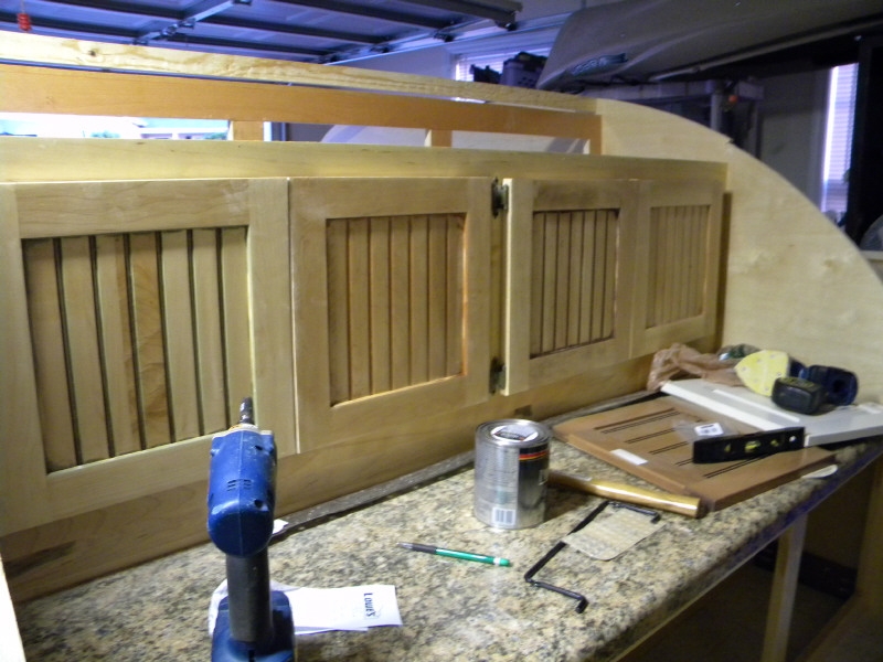 Doors for upper galley cab