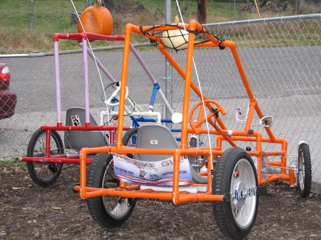 Orange is a beach combing Bicycle with Electric motor