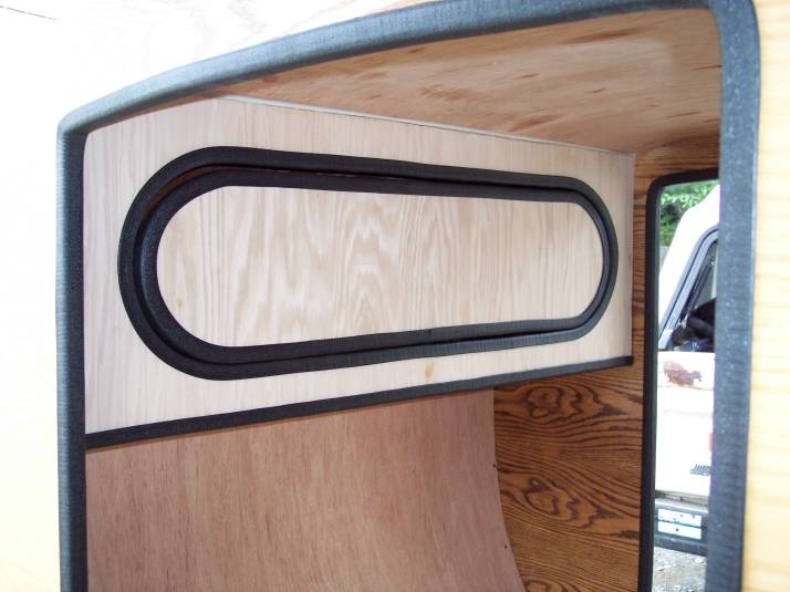 oval linen closet with edge trim