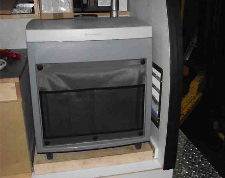 The Dometic 3 Way Fridge mounted on a custom pull out drawer