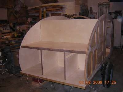 Galley with full bulkhead and walnut trim