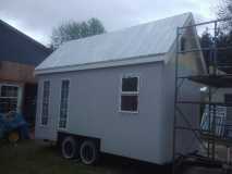 front gable framed and loft window cut in