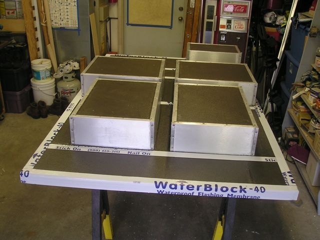 Floor structure with storage boxes attached ready to be turned over