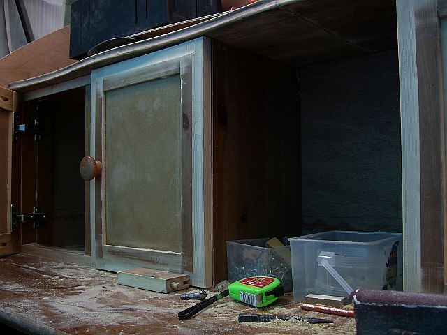 cupboards above drawers